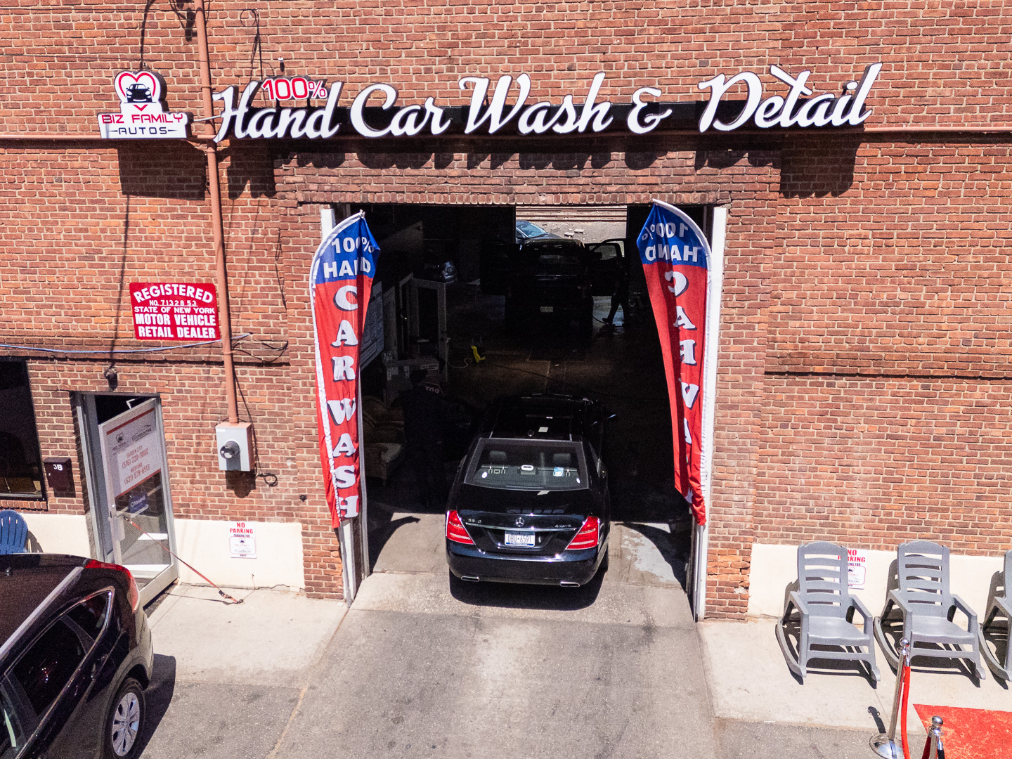 The customer entrance at Biz Family Autos, 3 Commercial Ave, Garden City